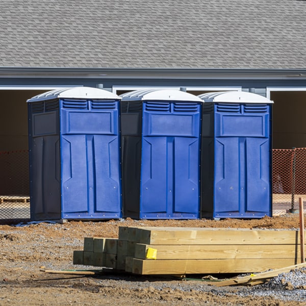 what is the cost difference between standard and deluxe portable toilet rentals in South Colby